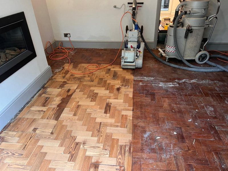 Bona Sander halfway through a job sanding back parquet flooring in a customers lounge